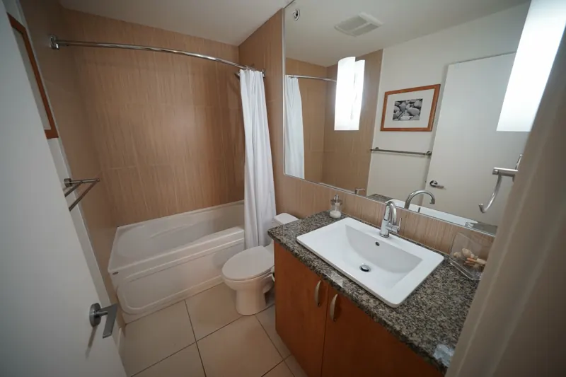Main bathroom with tub and shower
