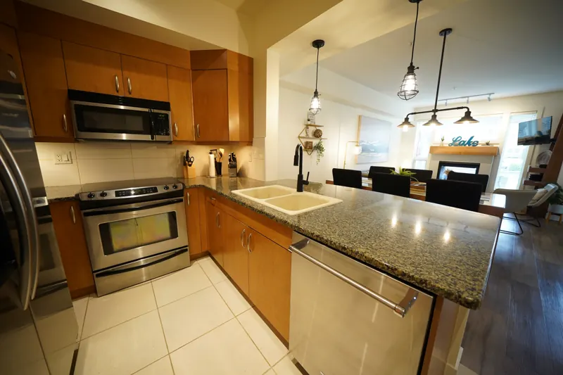 Kitchen with island and living room beyond